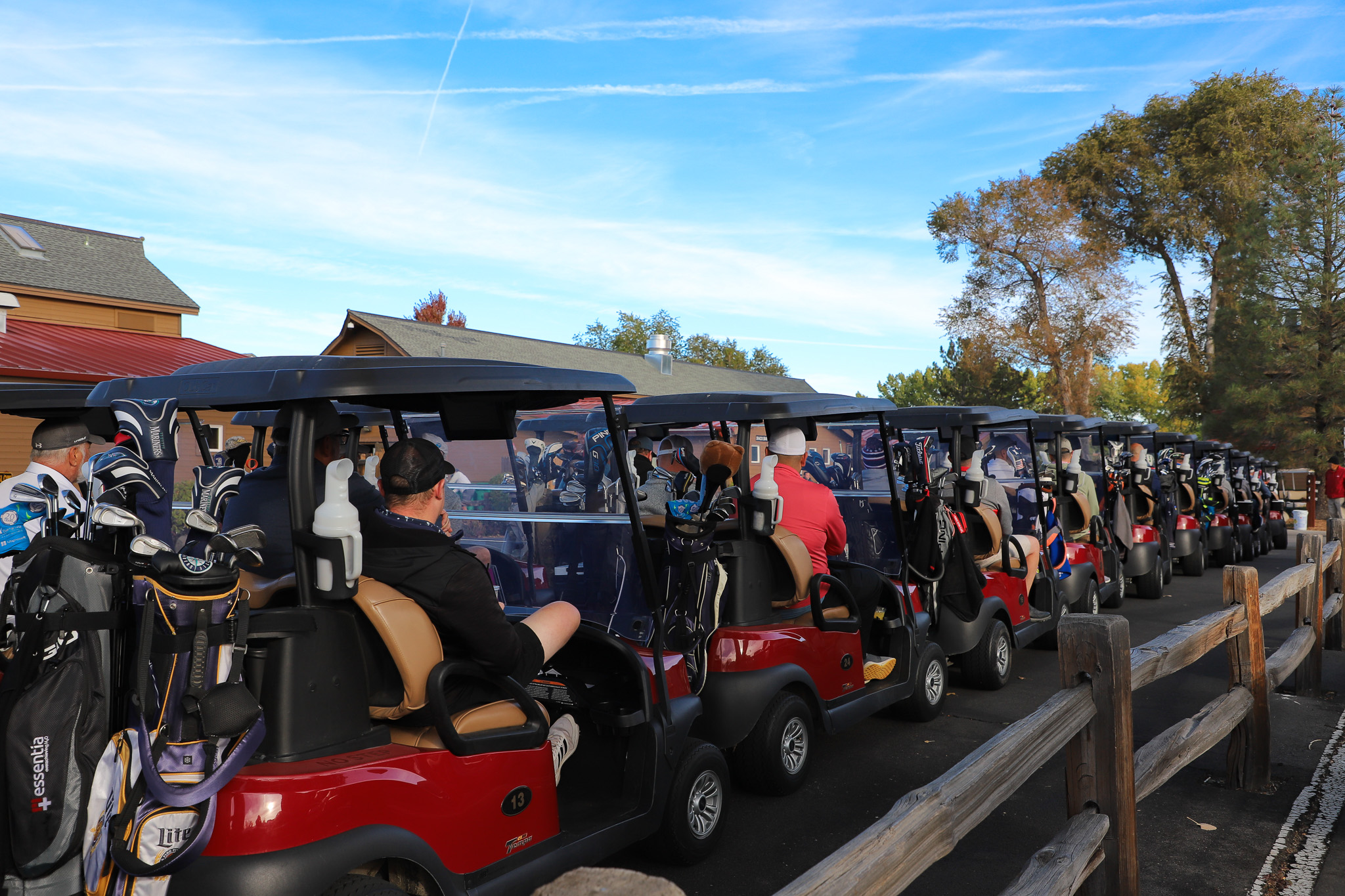 A line of golf carts getting ready to play in the Mayor’s Cup Golf Tournament. 